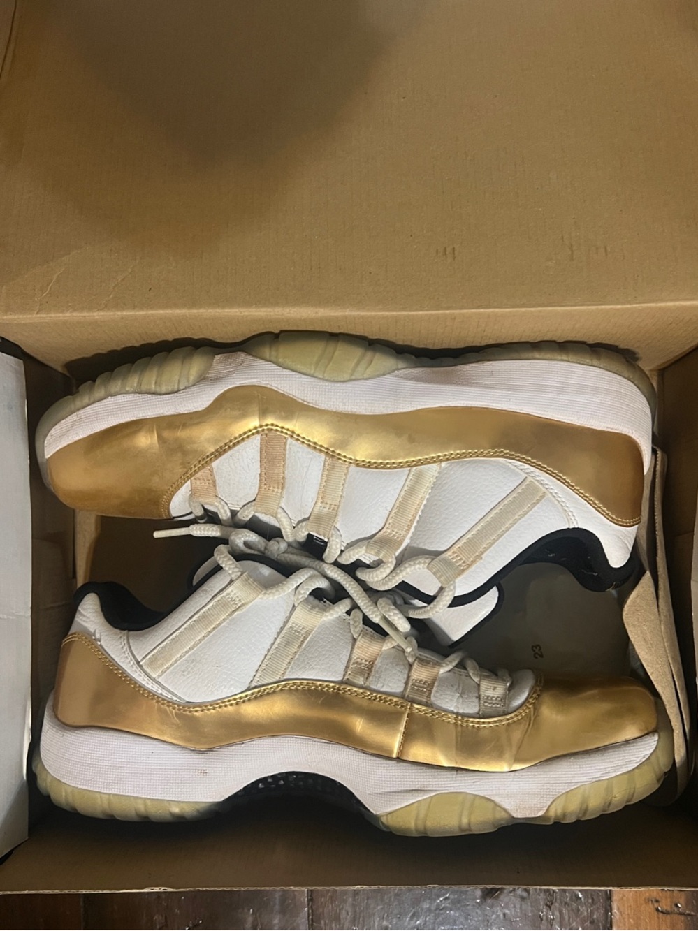 Jordan Air Jordan 11 Retro Low in White and Gold